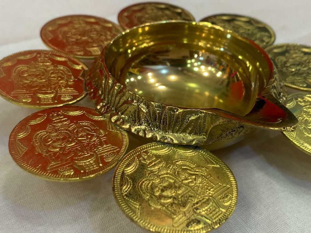Divine Bija Brass Kubera Coin With Lamp Divine Bija India Pvt Ltd | A story of motivation, passion and unconditional commitment